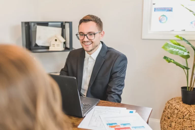 A man looking happy while discussing private lenders in Mississauga