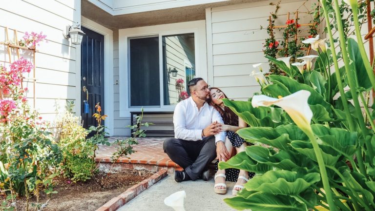 Family standing in front of their new home in Vaughan, symbolizing successful homeownership with the help of a private mortgage broker from Mortgage Squad Inc