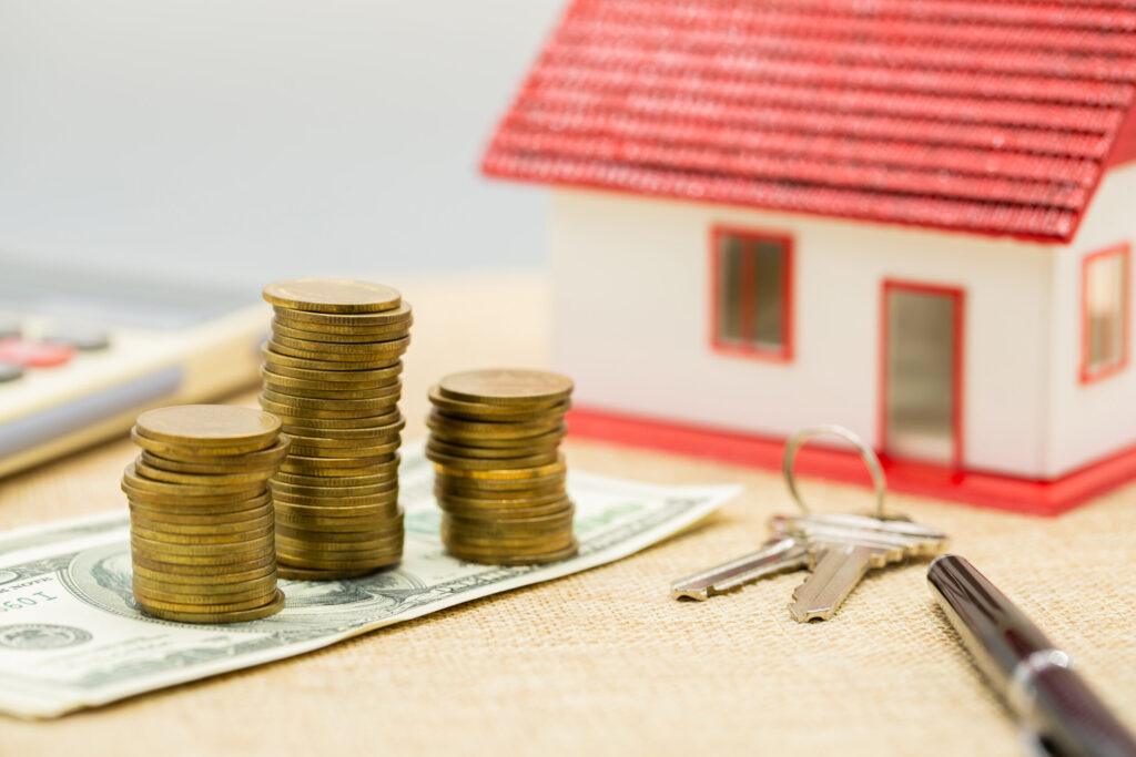 Planning savings money of coins to buy a home concept for proper