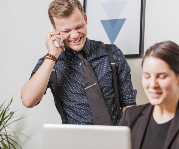 laughing-man-woman-office